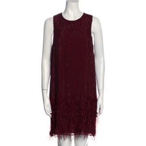 Parker black Allegra mini dress with feathers.